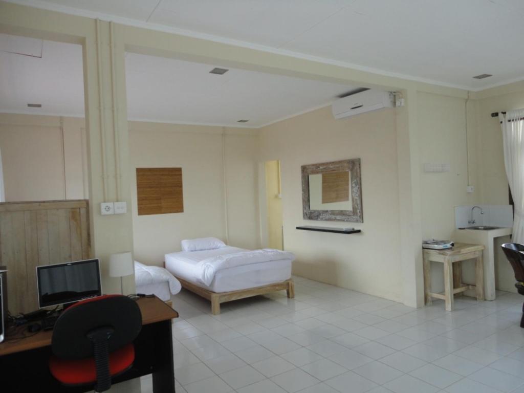 Urbanview Hotel Wayan Mansion Dempasar Cameră foto