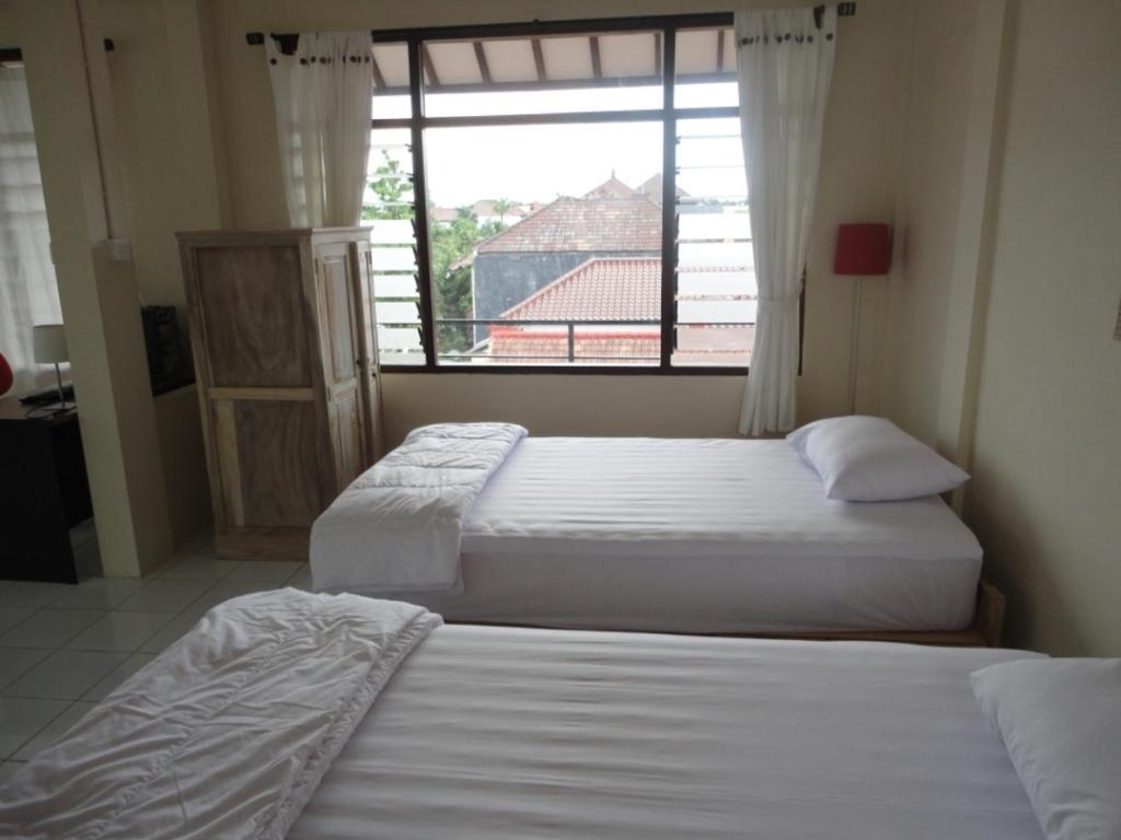 Urbanview Hotel Wayan Mansion Dempasar Cameră foto