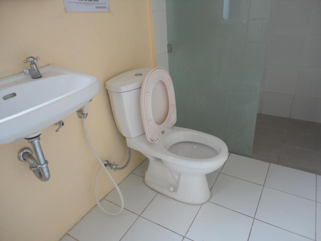 Urbanview Hotel Wayan Mansion Dempasar Cameră foto